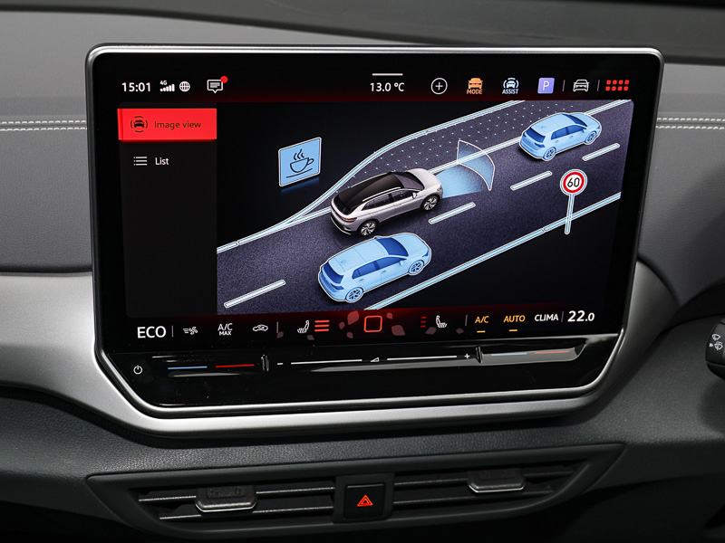 A close up of the VW ID.4's infotainment screen displaying lane keep assist on screen